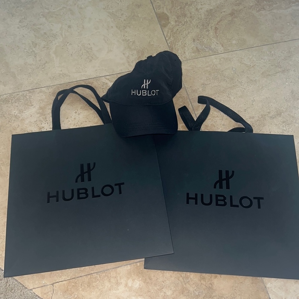 HUBLOT hat and two bags